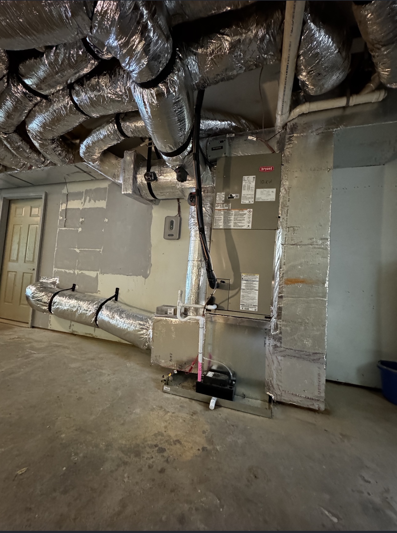 Bryant air handler and ductwork installed inside a home